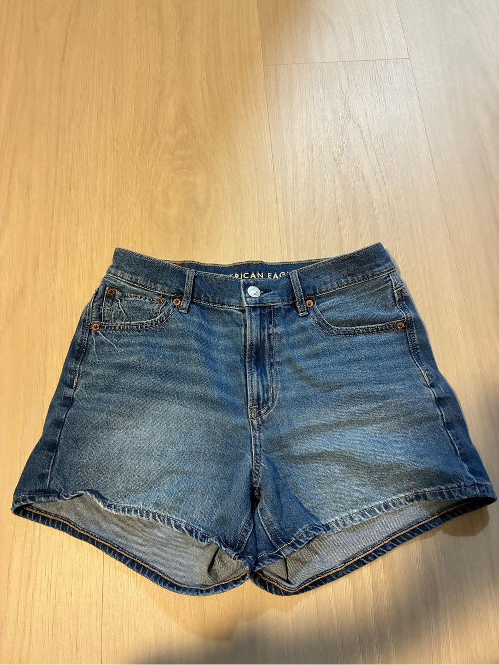 American Eagle Outfitters Distressed High-Rise Denim Shorts in Medium Blue